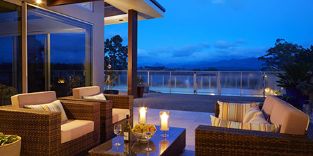 Almyra Waterfront Lodge Private Deck at Dusk